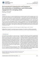 Socioemotional competencies and happiness: the moderation of mindfulness and social media engagement for emerging adults